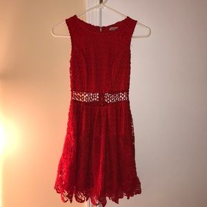 Red floral lace spring dress with open mid drift